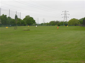 Golf Driving Range with various targets and distance signs  